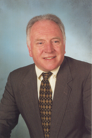 Mr. Dennis E. Parton